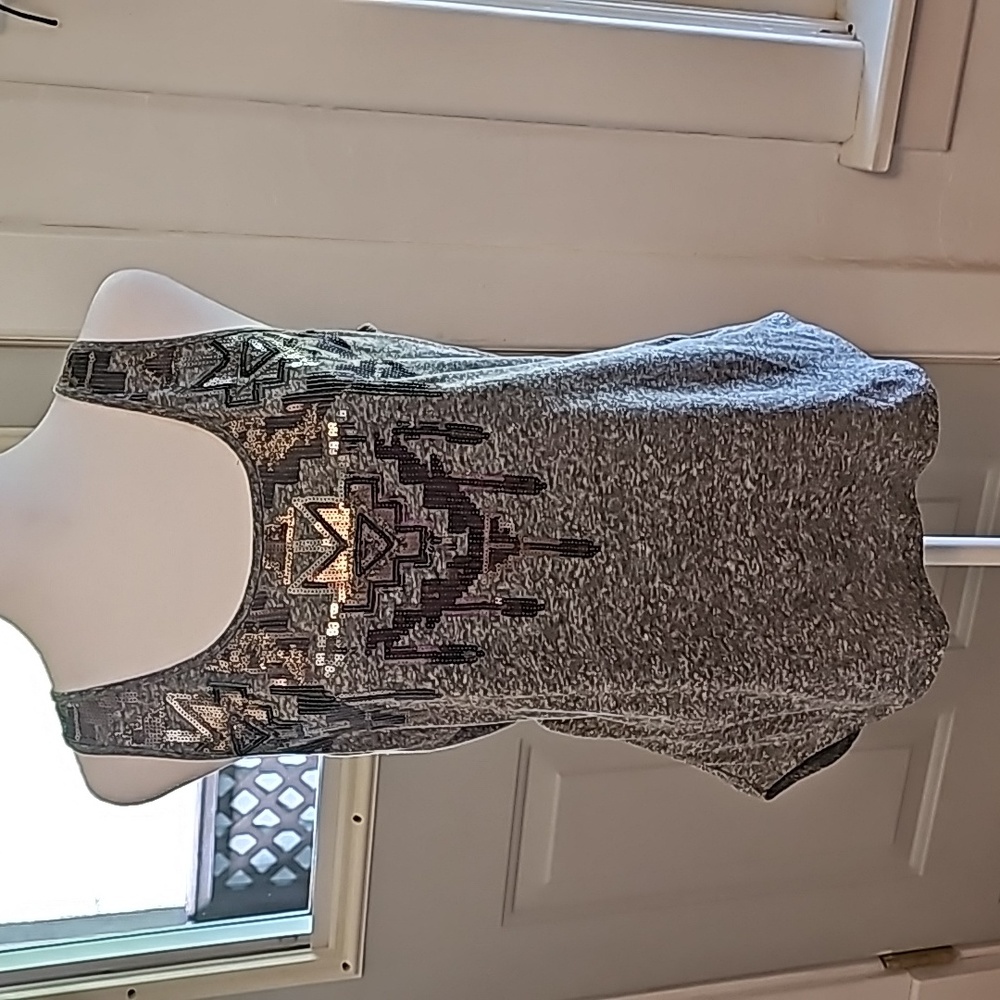 Express Tank Top Size Med in Womans. Beautiful embellished Tank top.